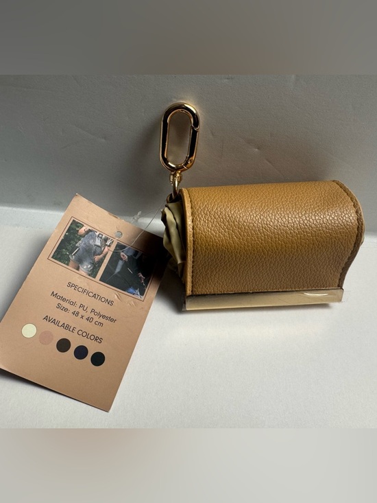 Handbags - A foldable tote bag charm with carabiner clasp for easy use of reusable bag.
